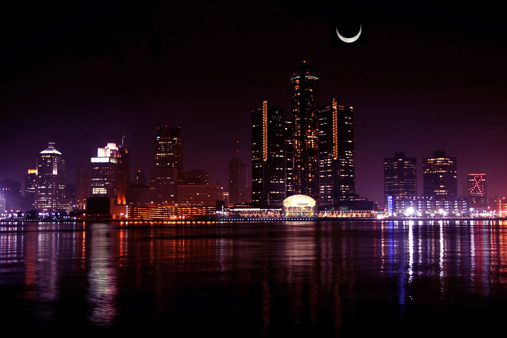 Detroit skyline at night and moon