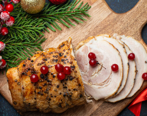 bigstock-Christmas-Baked-Ham-Sliced-Wit-465844689