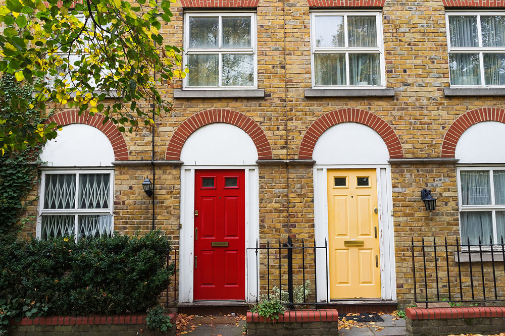 London house traditional brick wall facade and doors, UK, Europe