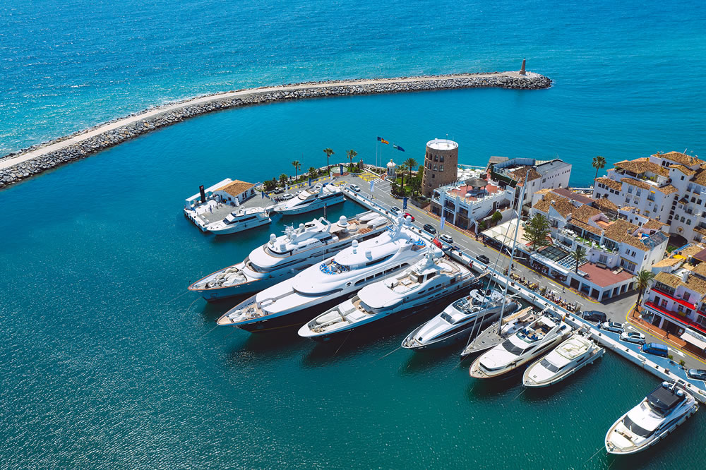 Aerial top view of luxury yachts in Puerto Banus marina, Marbella, Spain