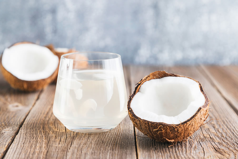 Coconut water in a glass close-up
