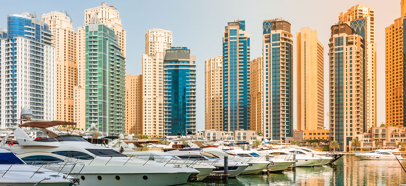 Dubai Marina with luxury yachts in UAE, cityscape