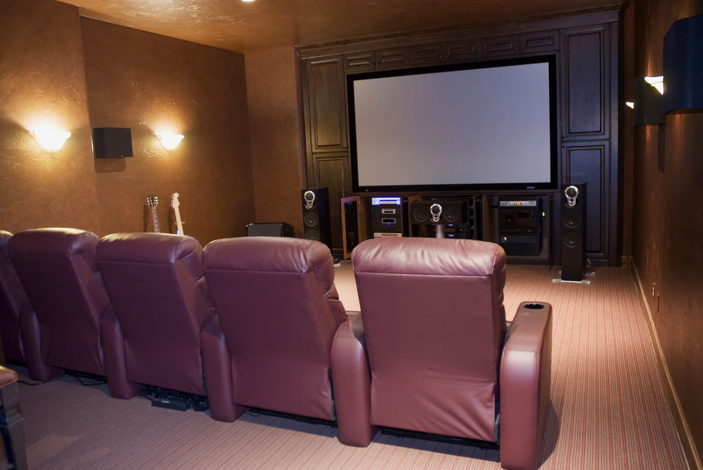 home theater media room with 4 chairs