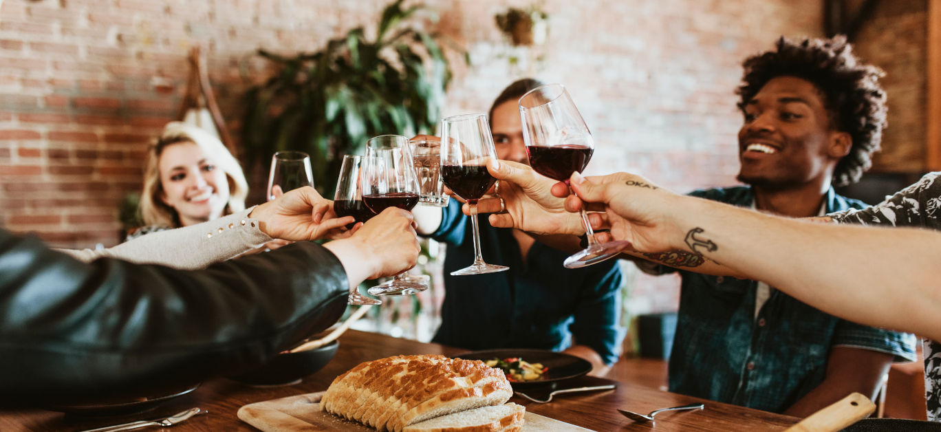 https://www.luxurylifestylemag.co.uk/wp-content/uploads/2023/02/bigstock-Friends-making-a-toast-at-a-di-423489512.jpg