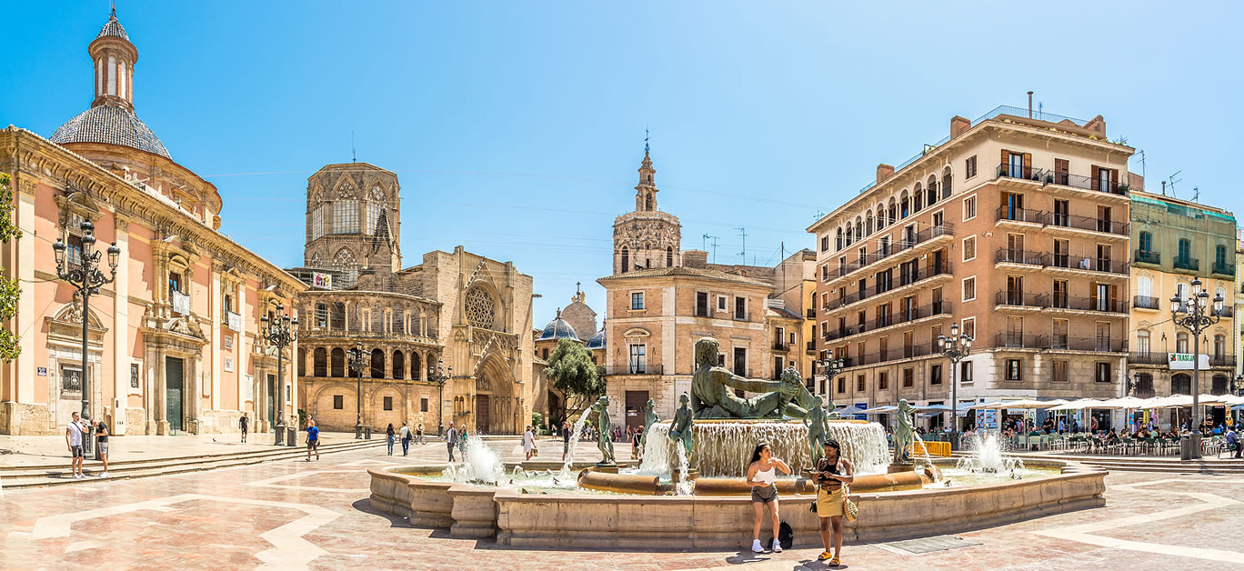 View at the Fountain of Turia ,Cathedral and Basilica of Our Lady at Virgin square of Valencia