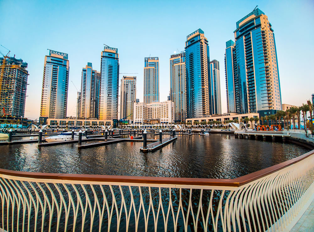 Dubai creek harbour new built residential area with modern buildings and calm water in Dubai, United Arab Emirates