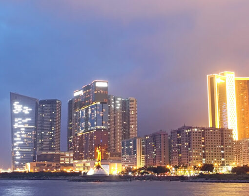 Macau at night, modern building for text