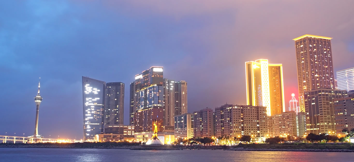 Macau at night, modern building for text