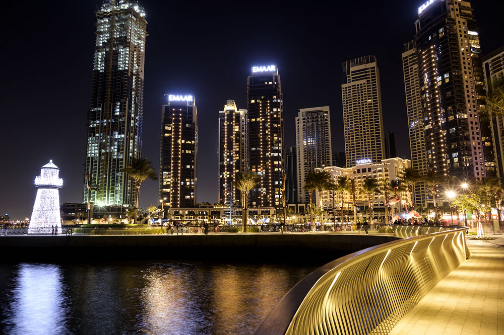 Dubai creek harbor skyline with embankment promenade