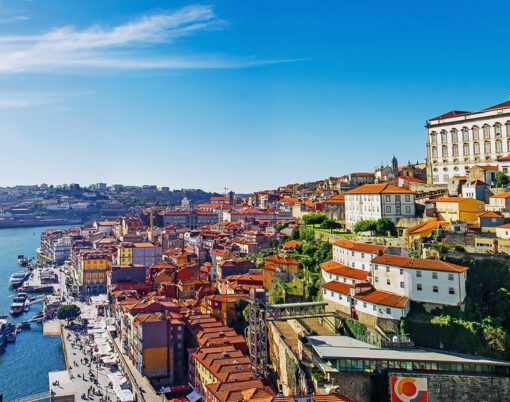 Porto Portugal old town skyline from Dom Luis bridge on the Douro River.