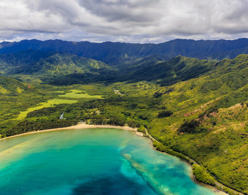 Aerial view Oahu coastline and mountains in Honolulu Hawaii from a helicopter
