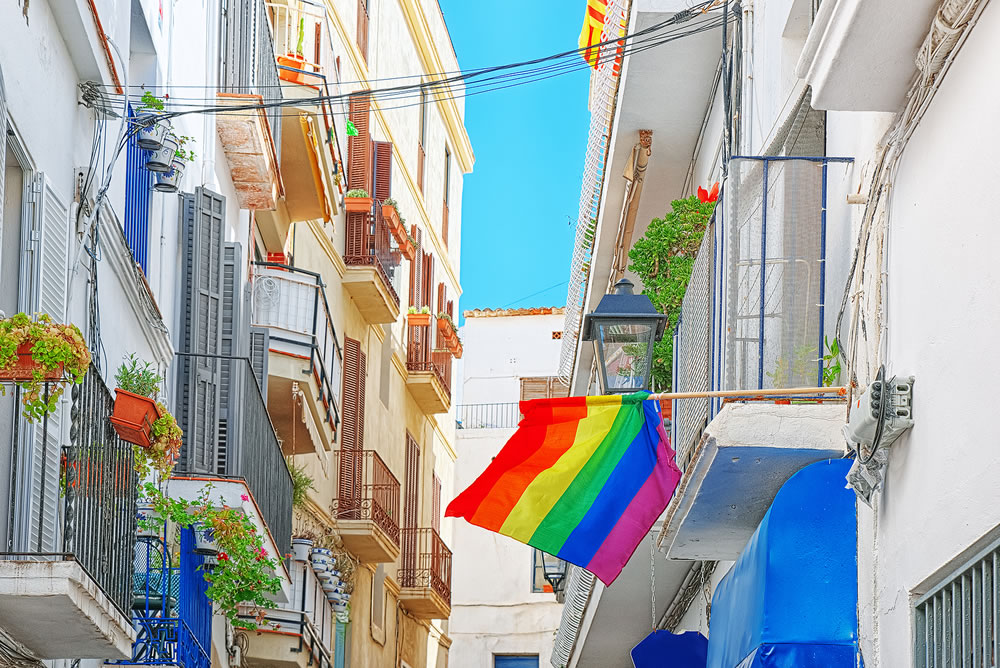 City views and gay flags on buildinds in a small town in the outskirts of Barcelona - Sitges.