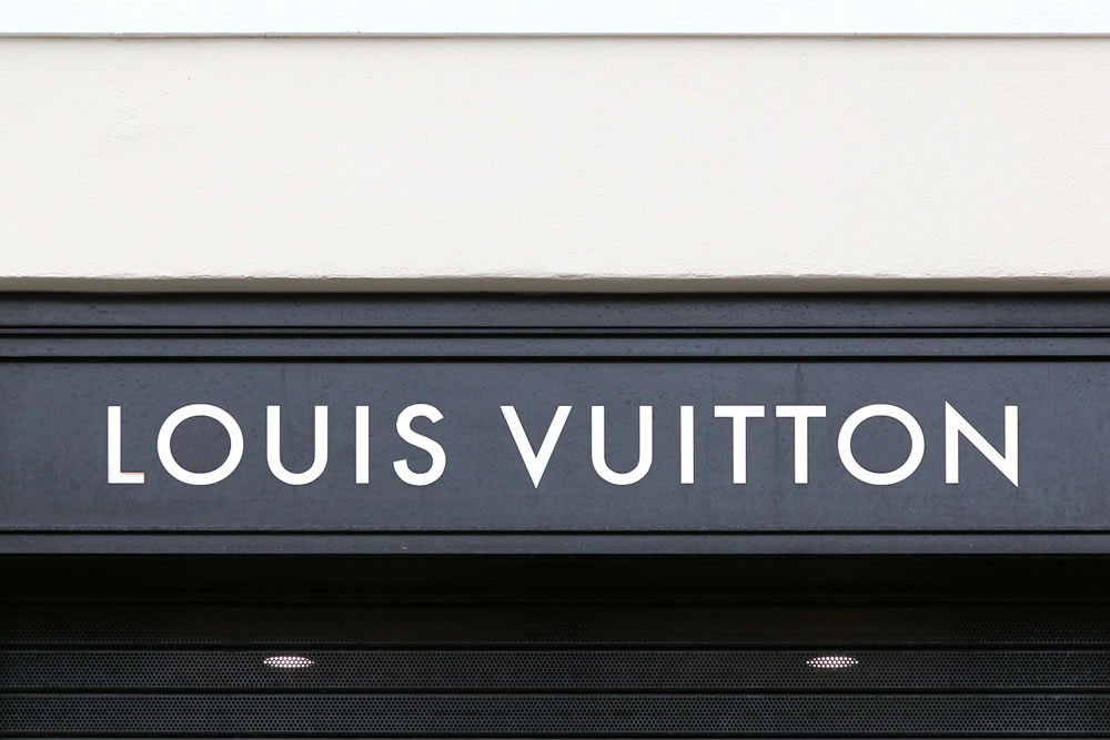 Louis Vuitton sign on a wall