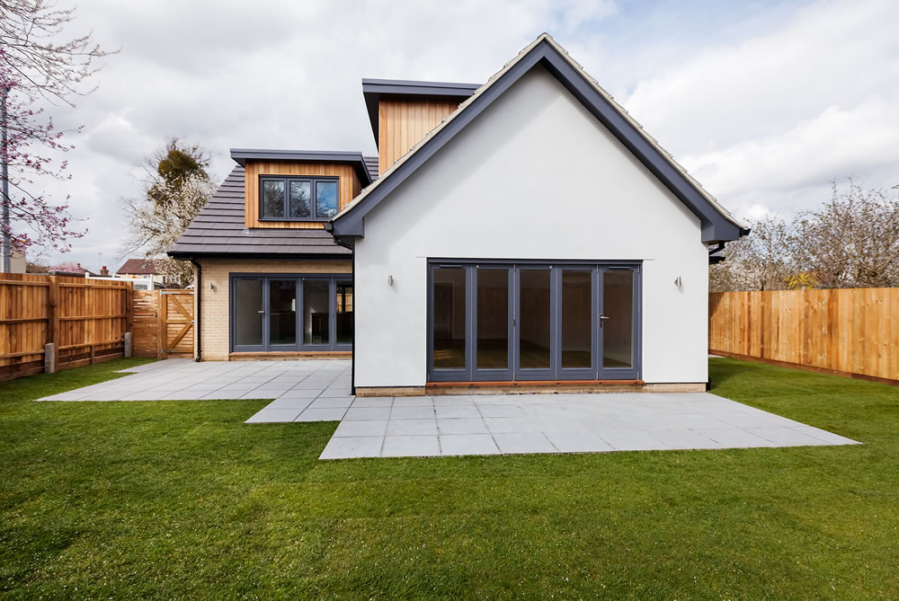 Enclosed garden patio and lawn to brand new just completed detached home.