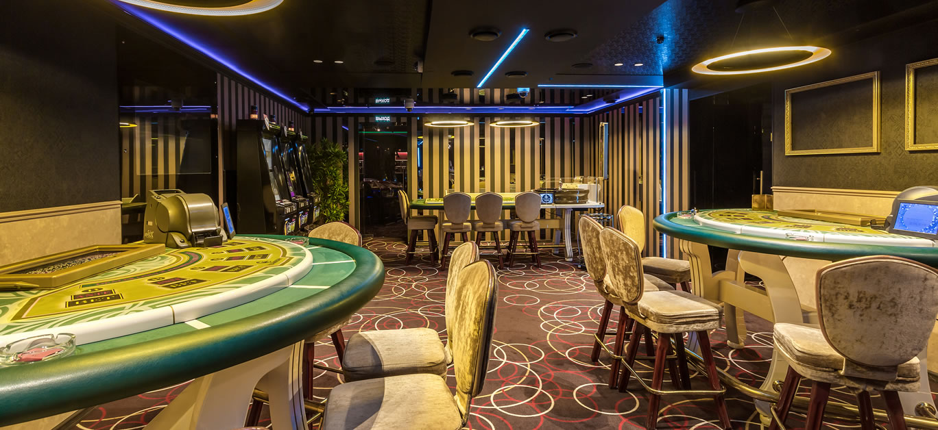 interior of elite luxury vip casino with poker tables