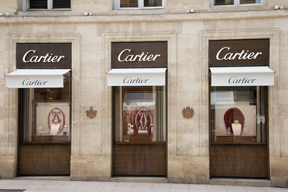 Cartier text sign and logo brand front facade boutique luxury jewellery store