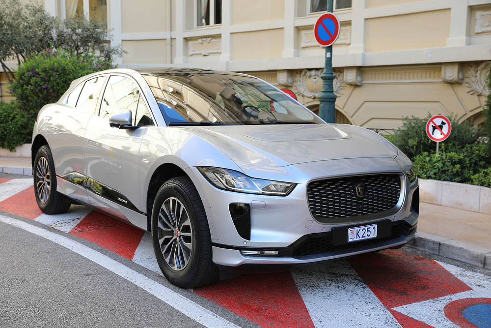 Sophisticated gray Jaguar I-PACE, a fully-electric luxury crossover SUV, parked on a street in Monte Carlo, Monaco, captured from a front three-quarter angle