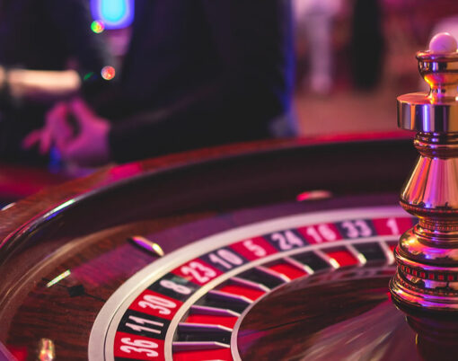 Vibrant casino table with roulette in motion