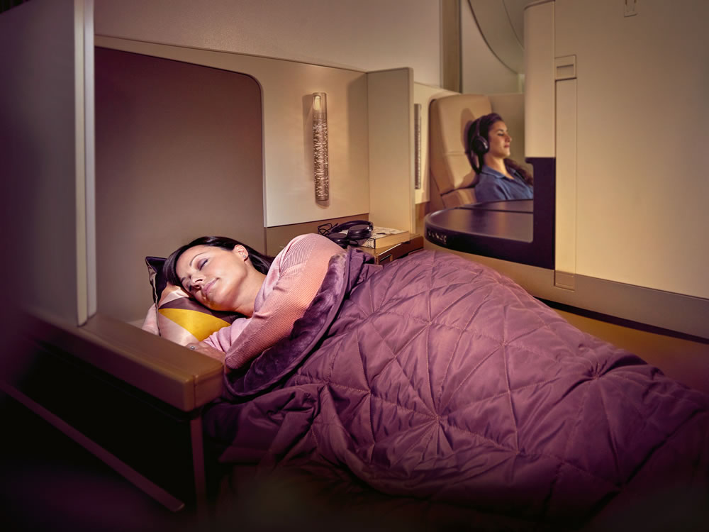 Etihad Airways woman sleeping