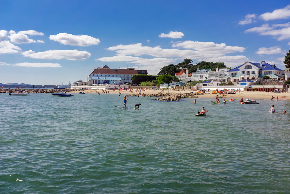 Clear blue waters and sandy beaches of Sandbanks in Dorset
