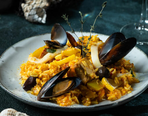 Classic dish of Spain, seafood paella. Spanish paella with shrimps, clamps, mussels. mediterranean cuisine