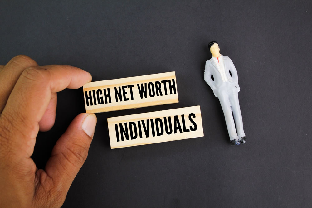 miniatures of people and sticks with the words High Net Worth Individuals