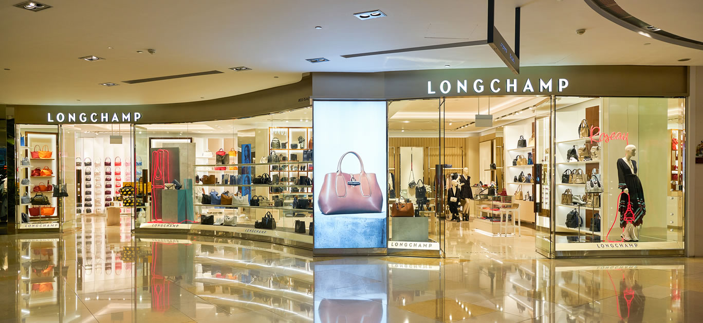 Longchamp storefront in ION Orchard shopping mall in Singapore. Longchamp is a French luxury leather goods company.