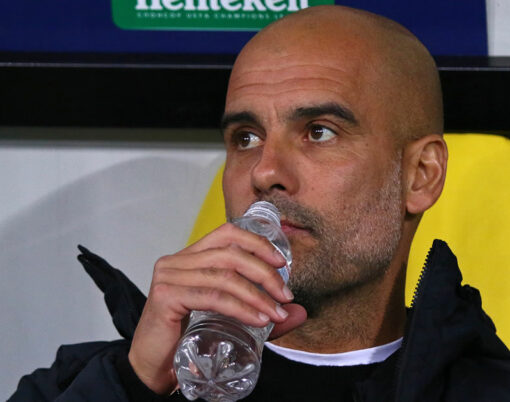 Manchester City manager Josep "Pep" Guardiola drinks water