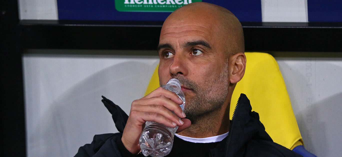 Manchester City manager Josep "Pep" Guardiola drinks water