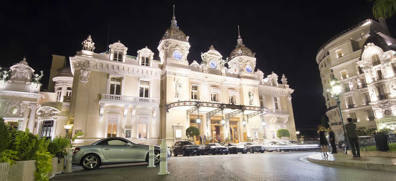 view of Monte Carlo casino at night.