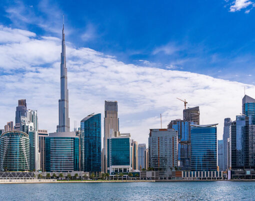 Skyline of the downtown district of Dubai seen from the Canal water level in Business Bay