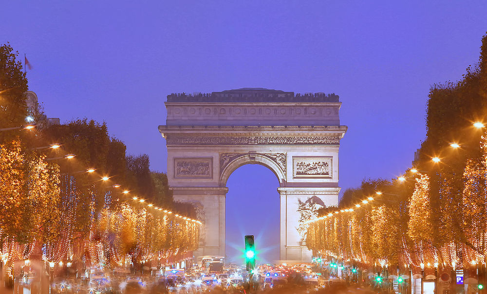 The Triumphal Arch and Champs Elysees avenue illuminated for Christmas, Paris, France.