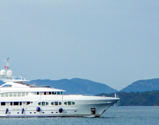 large private motor yacht in modern style on light background