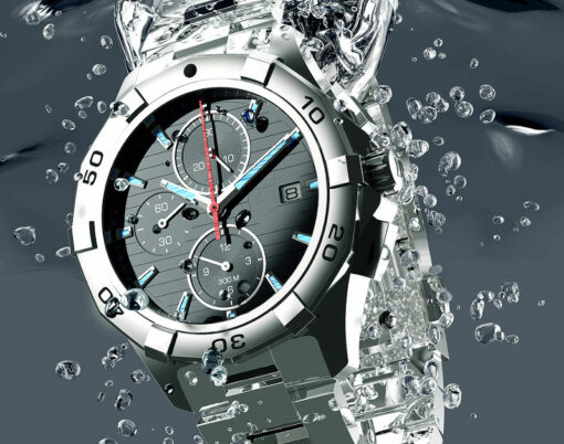 beautifull metal wrist watch is under water.