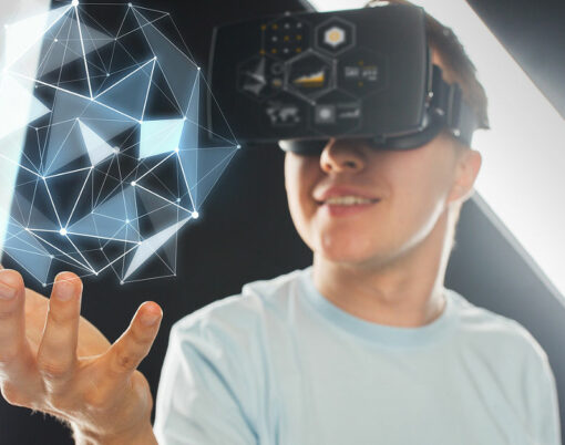 3d technology, virtual reality, science and people concept - close up of happy young man with virtual reality headset or 3d glasses playing game and holding polygonal shape projection