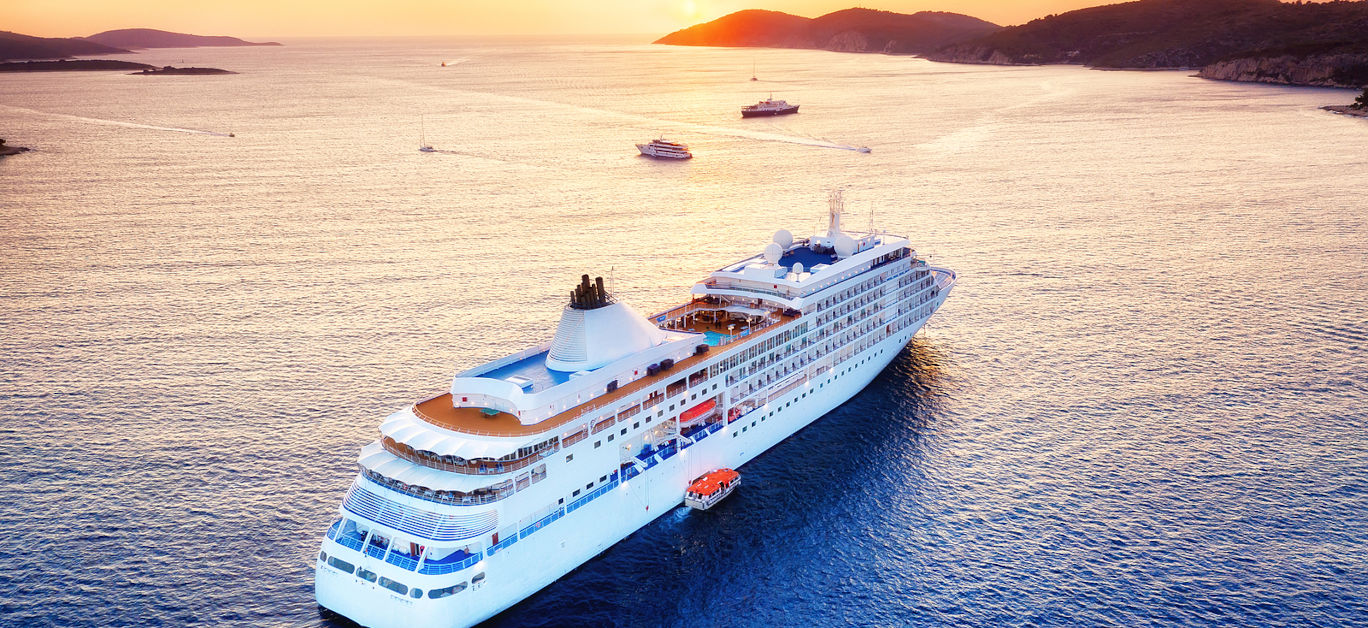 Aerial view at the cruise ship during sunset. Adventure and travel