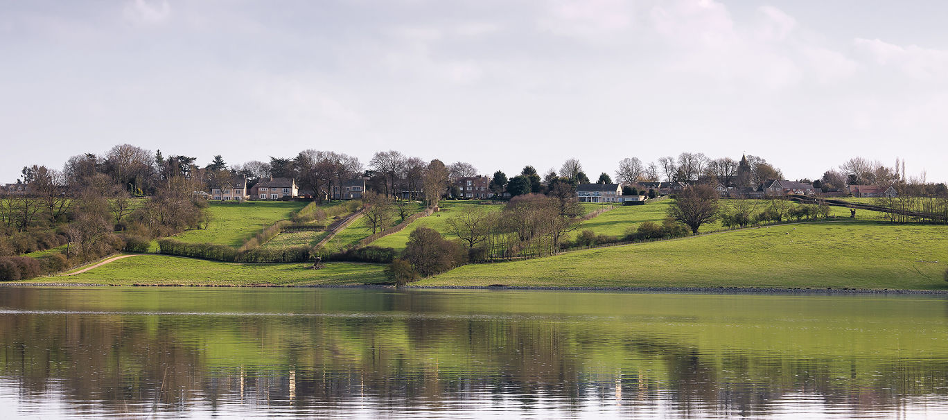 An image showing the Village of Upper Hambleton shot across Rutland Water, Rutland, England, UK