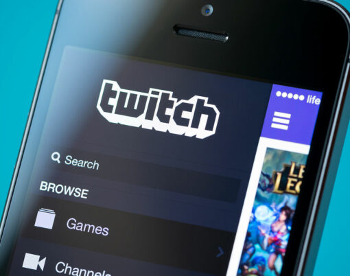 Close-up shot of brand new Apple iPhone 5S with Twitch video streaming service application on a screen.