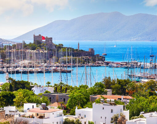 View of Bodrum castle and Marina Harbor in Aegean sea in Turkey