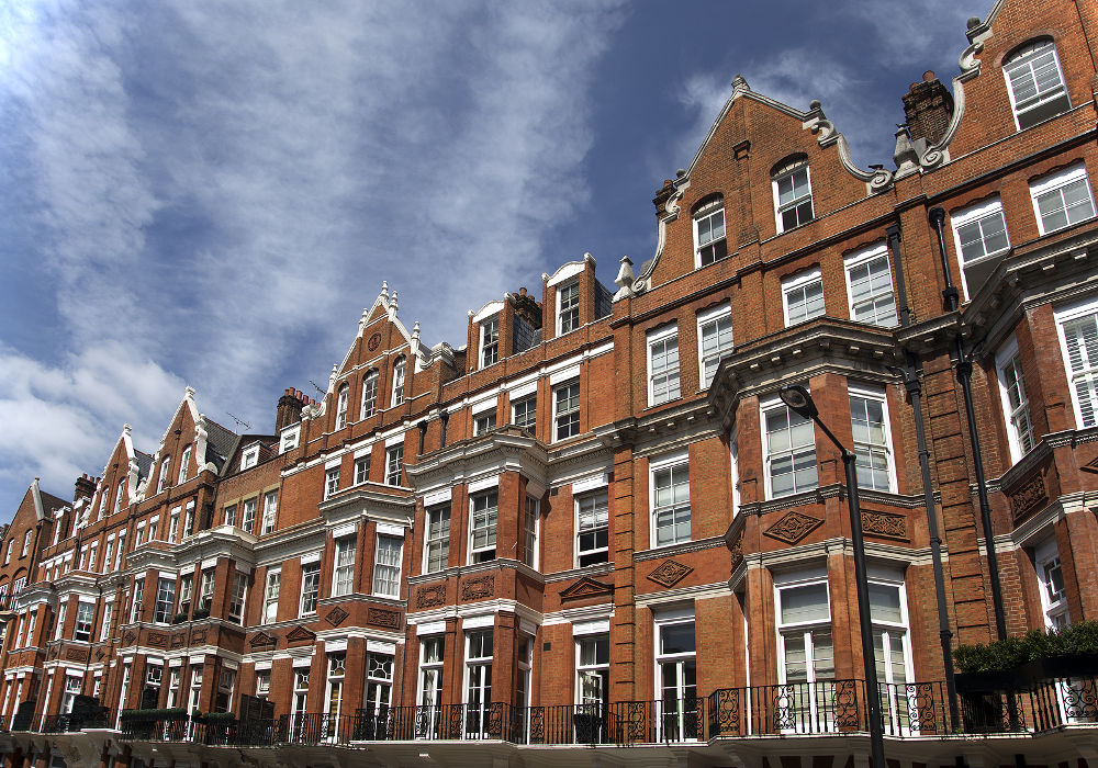 Row of red brick apartments in Mayfair, London