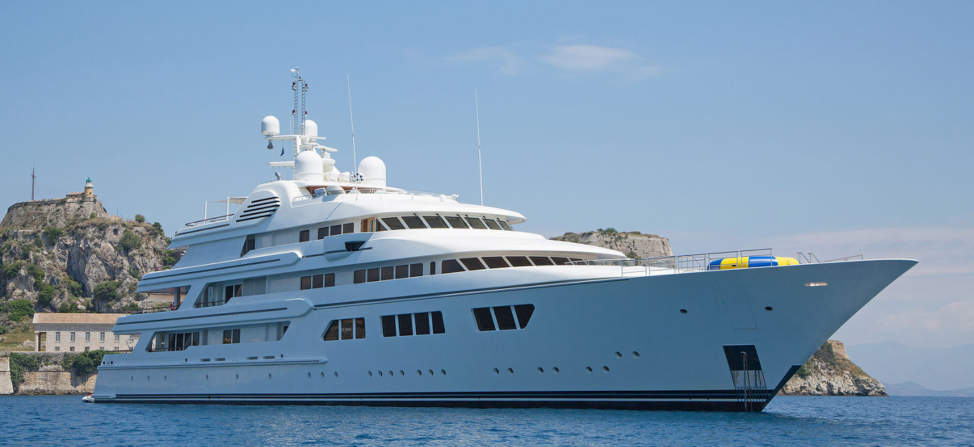 Luxury large super or mega motor yacht in the blue ocean.