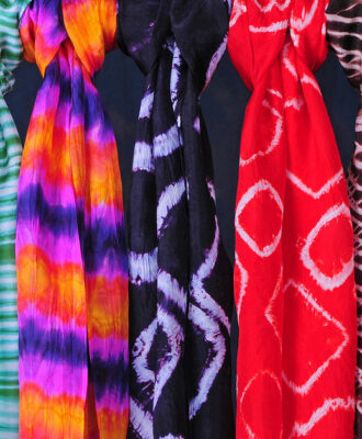 Hand-dyed silk scarves using various Japanese shibori methods.