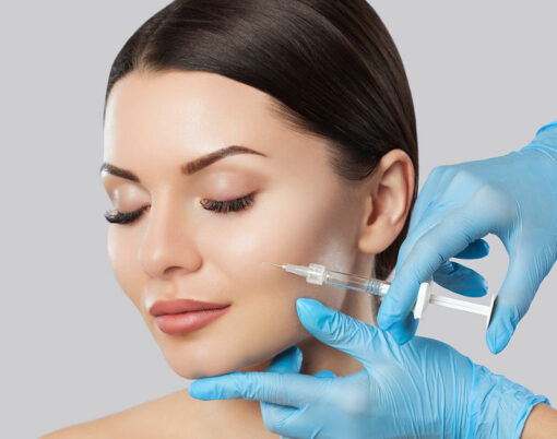 The doctor cosmetologist makes the Rejuvenating facial injections procedure for tightening and smoothing wrinkles on the face