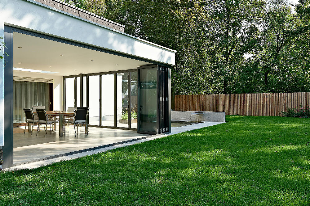 Modern villa house exterior in garden