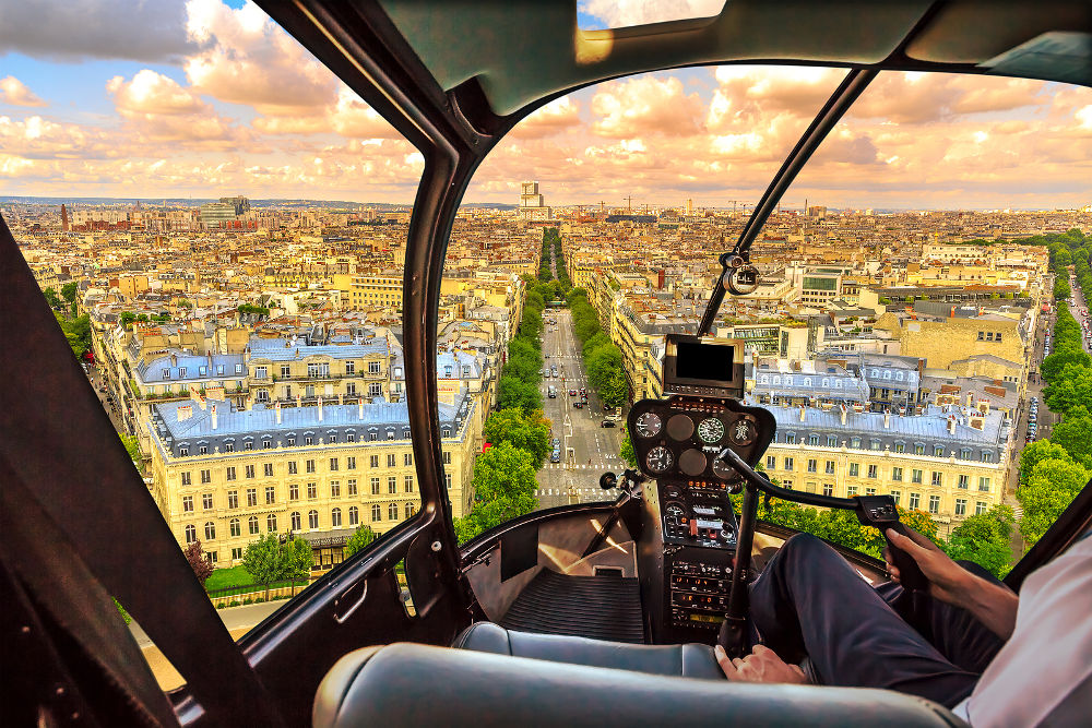 Helicopter cockpit flying on Paris skyline of the French capital, Europe