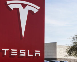 Tesla Service Center. Tesla designs and manufactures the Model S electric sedan IV