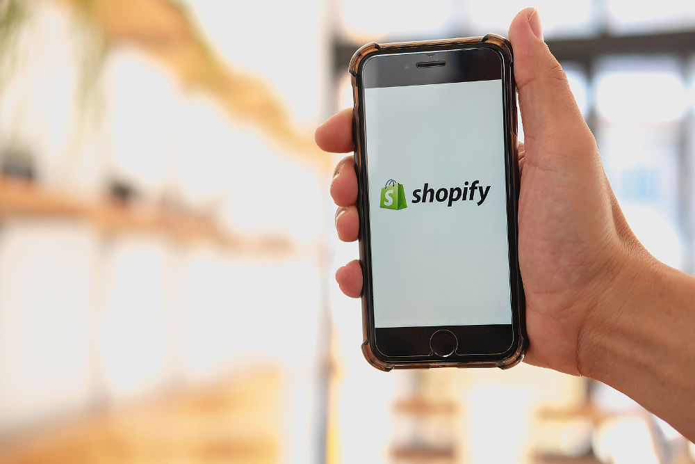 Mobile Phone with Shopify application on the screen