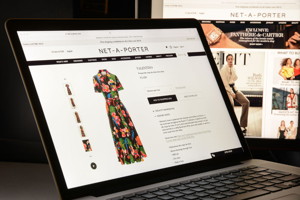 Net-a-porter multi brand website homepage. It's a fashion e-commerce store.