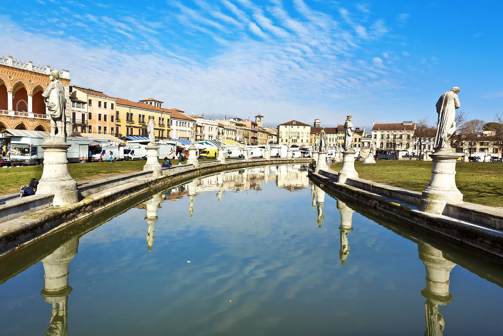 View of the canal with statues on Prato della Valle in Padova Veneto Italy
